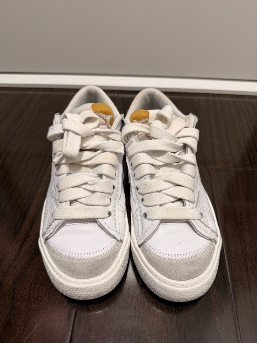 White Low-Top Sneakers with Suede Toe and Yellow Tongue Accent